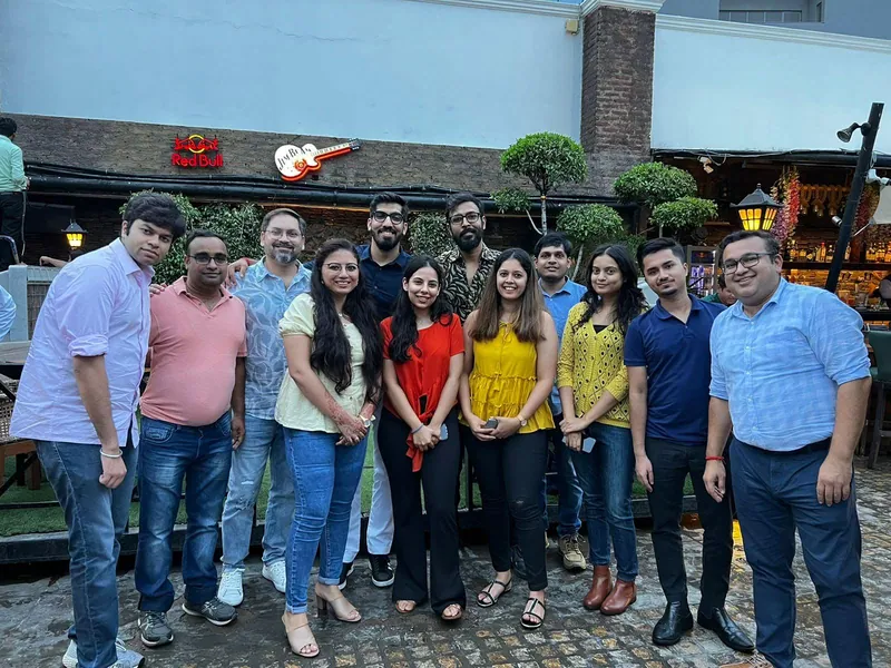 Kousik with Airtel colleagues outdoors
