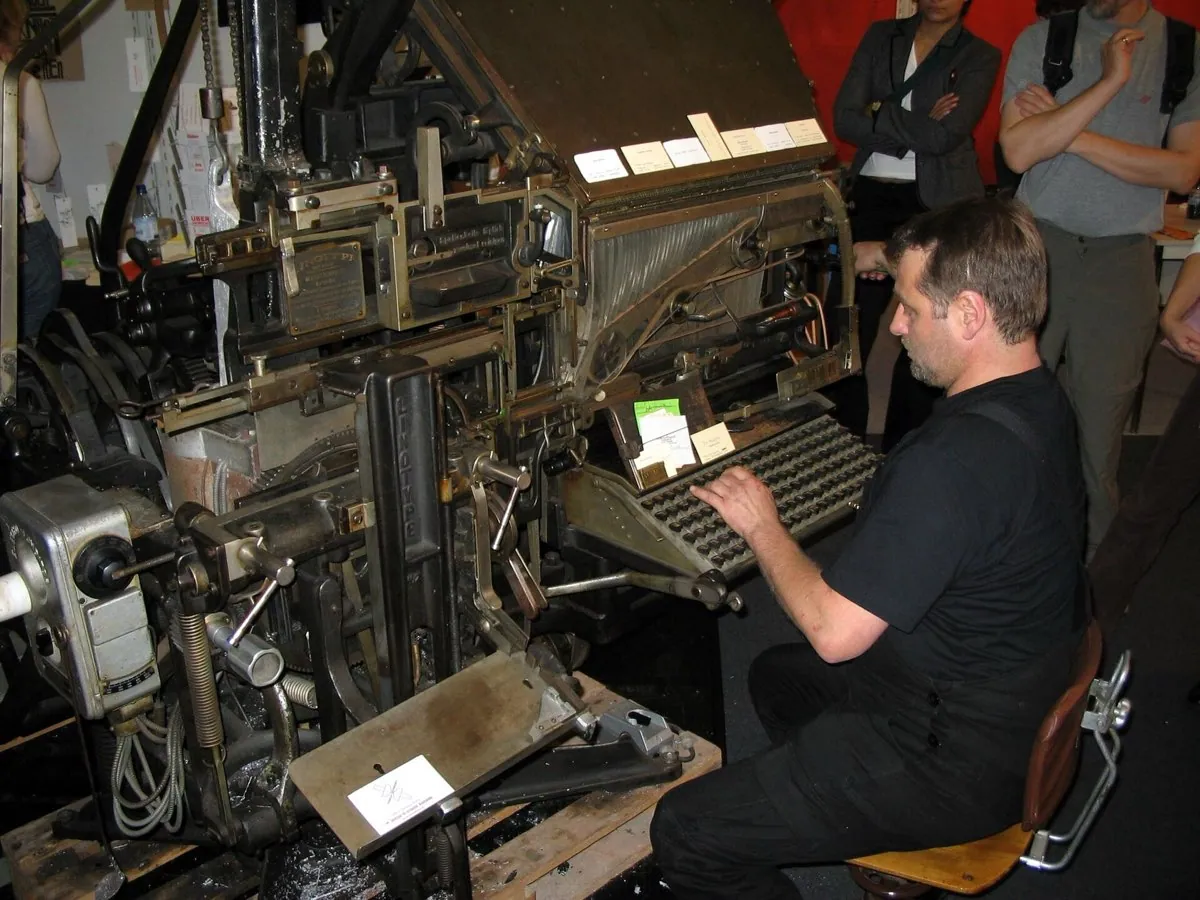 A Linotype hot metal typesetting machine, with its keyboard, magazine of matrices, and casting mechanism.